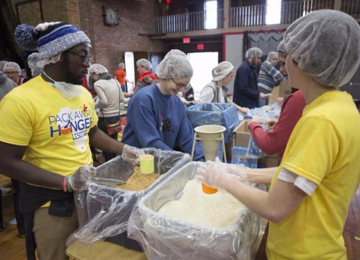 Students Packing Meals for Lesotho
