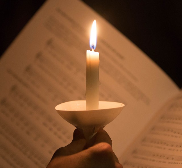Candle and Sheet Music