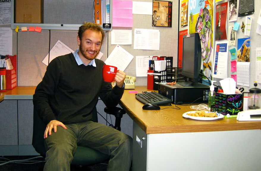 Werner Sits at his desk in Louisville