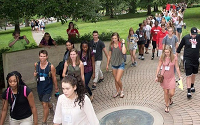 Students Walking Across Campus