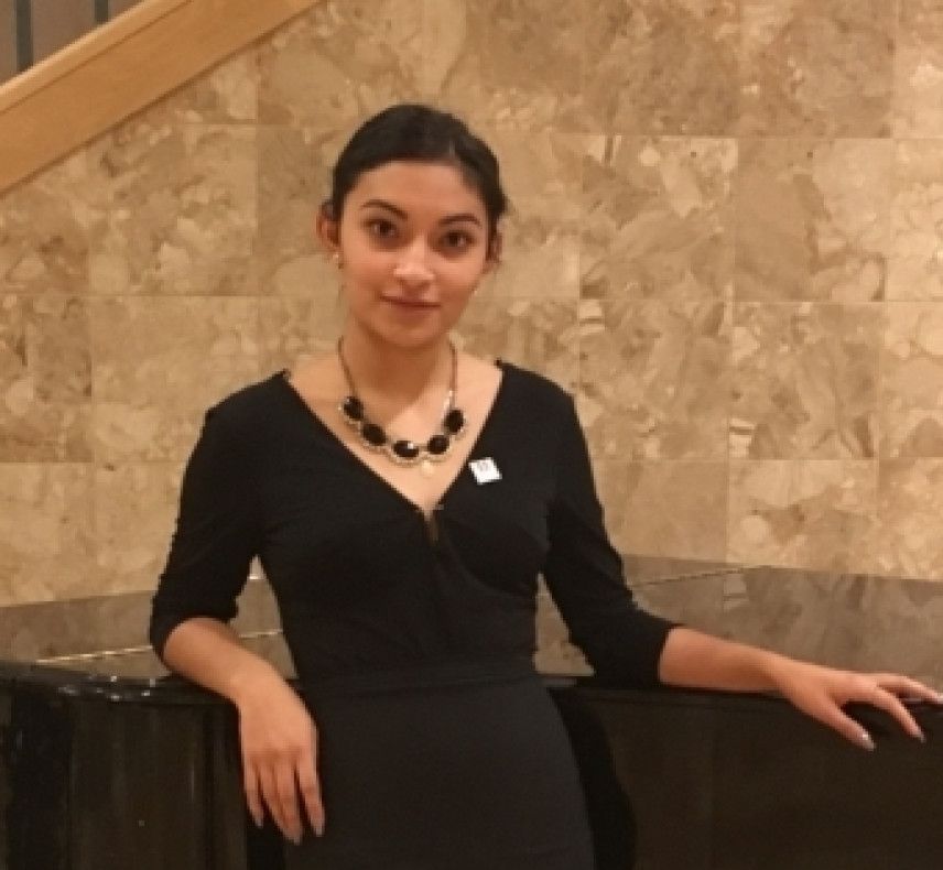 Vanessa Orduna in front of a Piano