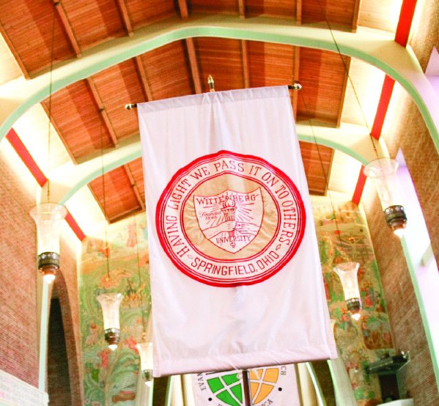 Pastor Installation having light banner in chapel