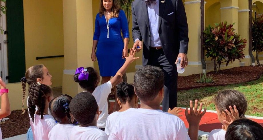 Bryan meeting school children.