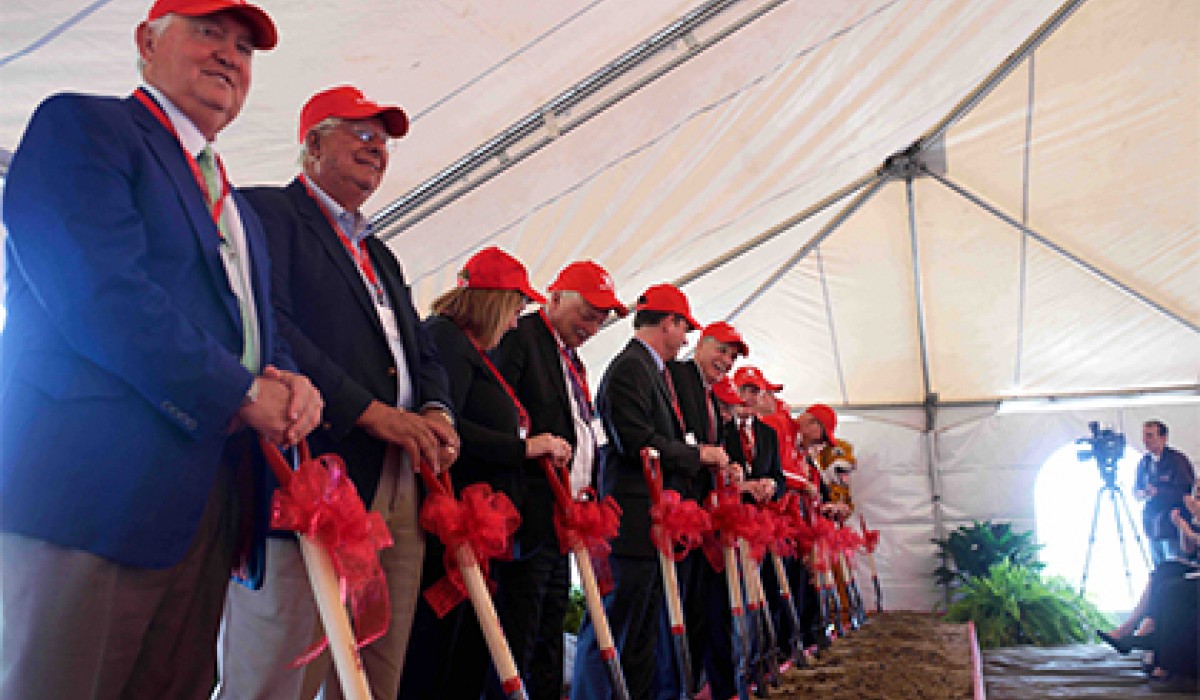 Shovels in hand at groundbreaking ceremony