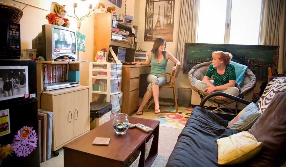 Students talking in a Tower Hall room