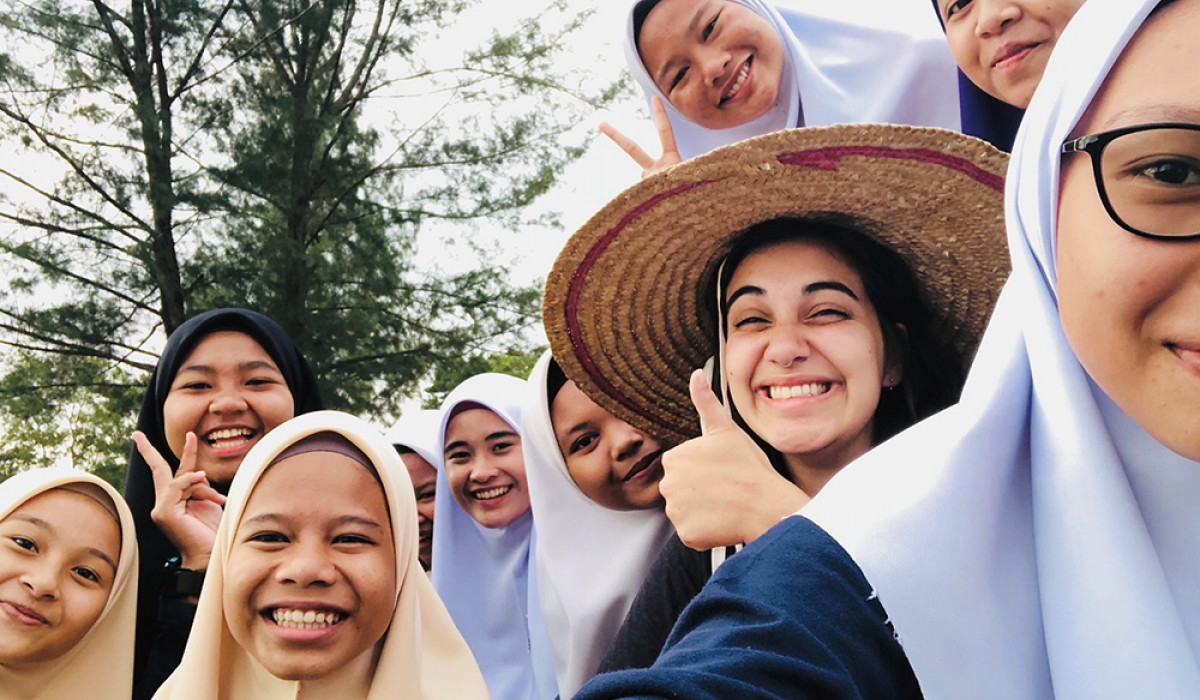 Maria Symons with her students in Malaysia