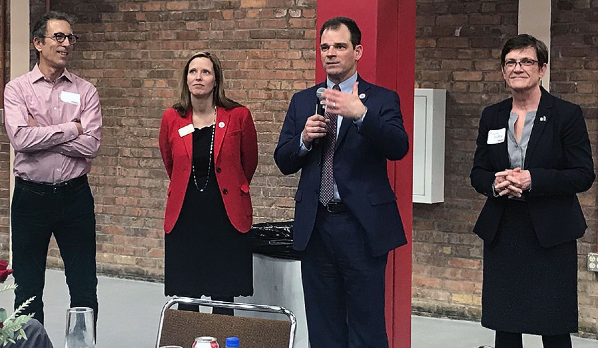 Wittenberg Provost Michelle Mattson (right) is introduced by University President Michael Frandsen (with microphone) and search committee chairs Michael Anes (left) and Casey Gill (second from left)