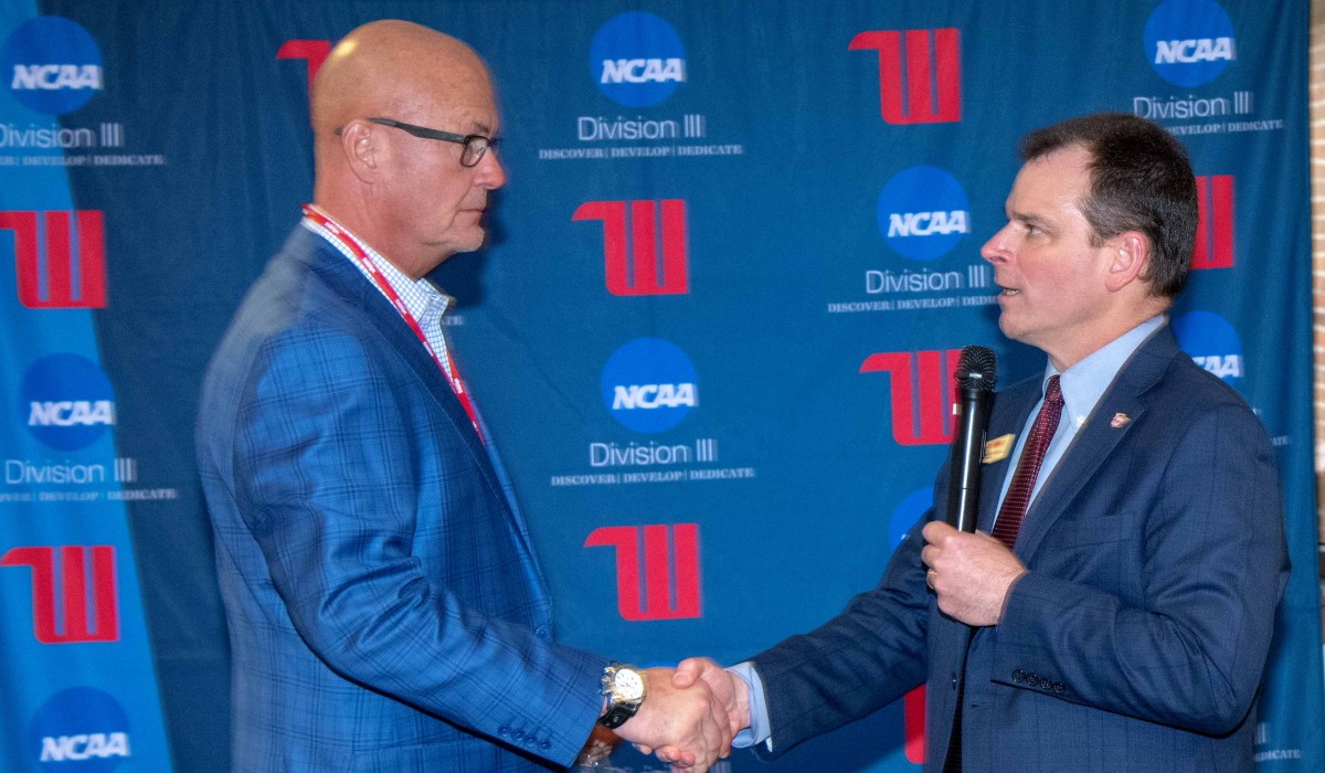 Tim Kremchek '81 and University President Mike Frandsen