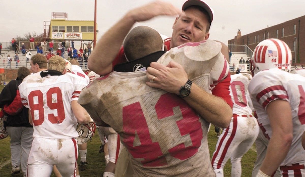 Joe Fincham hugs Ryan Gresham after win at Hardin-Simmons in 2001