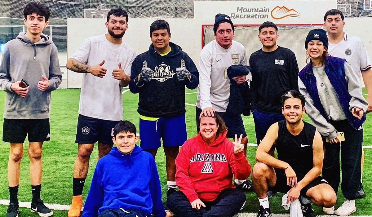 Jordan Bamberger and students in the Red Canyon High School soccer program