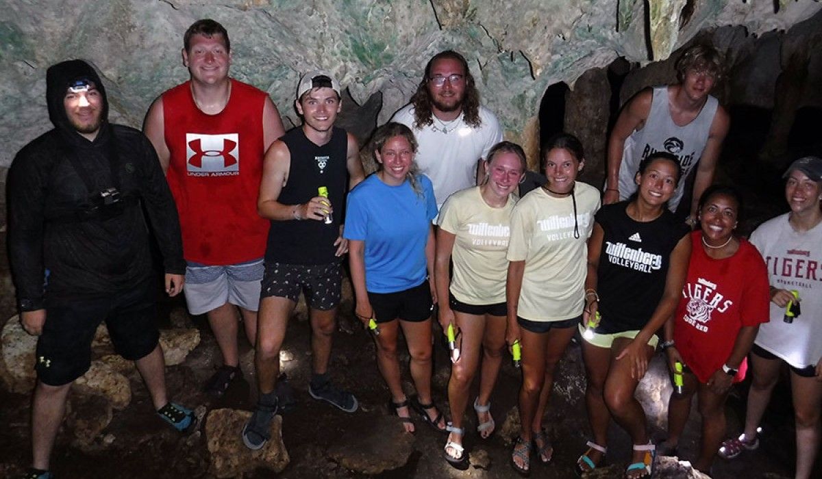 shot of the group in lighthouse cave