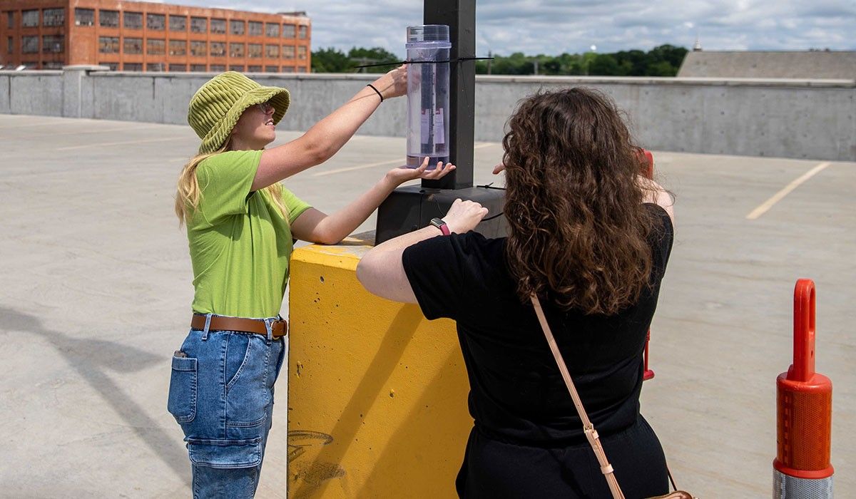 Deza Frega and Assistant Professor of Environmental Science Stacy Porter