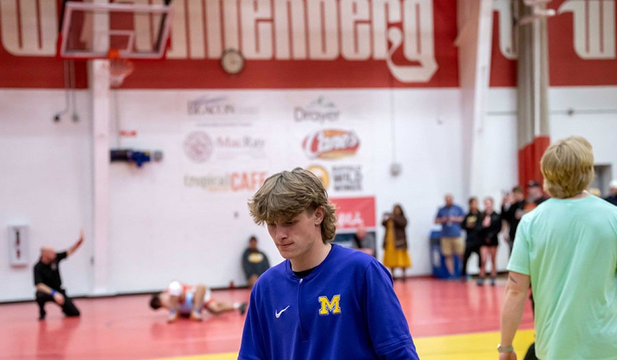 Wrestler with Wittenberg Logo