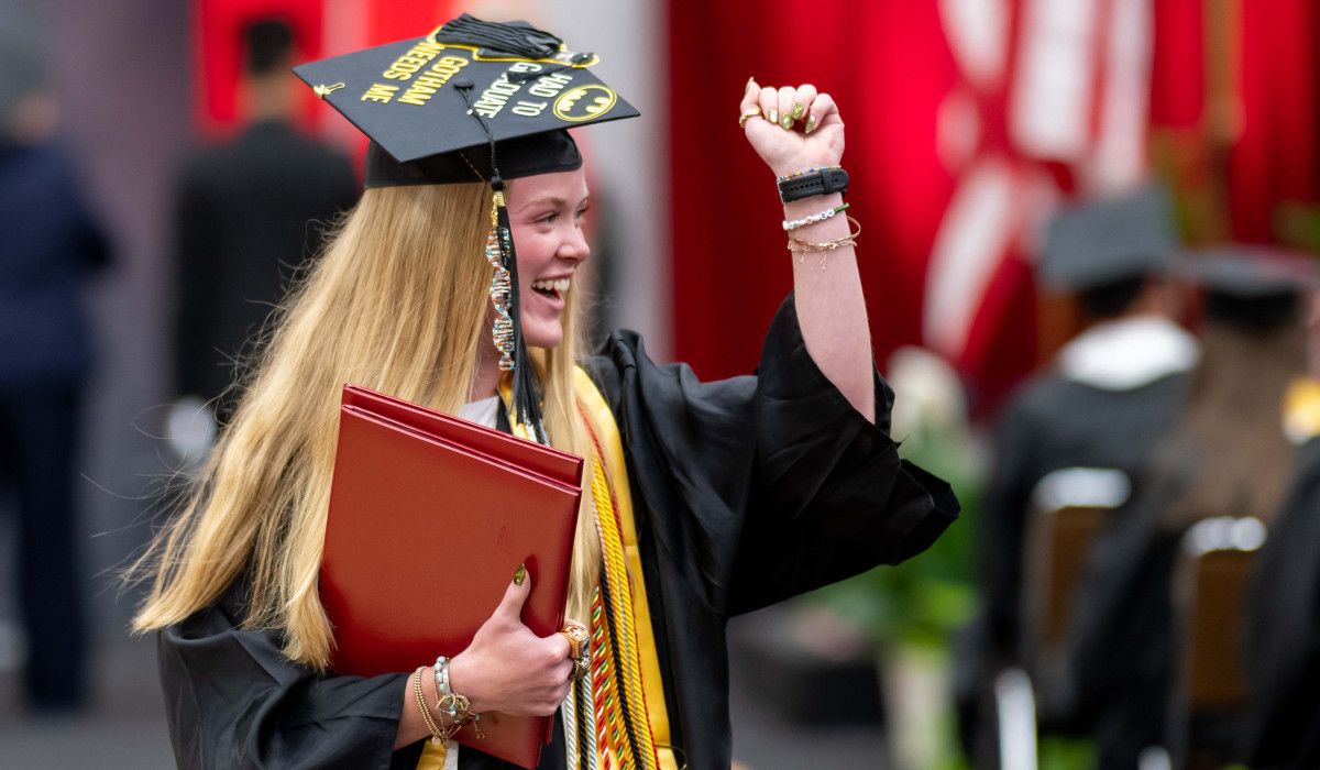 Cheering after earning diploma