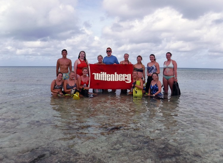 Snorkelers heading out to the reef