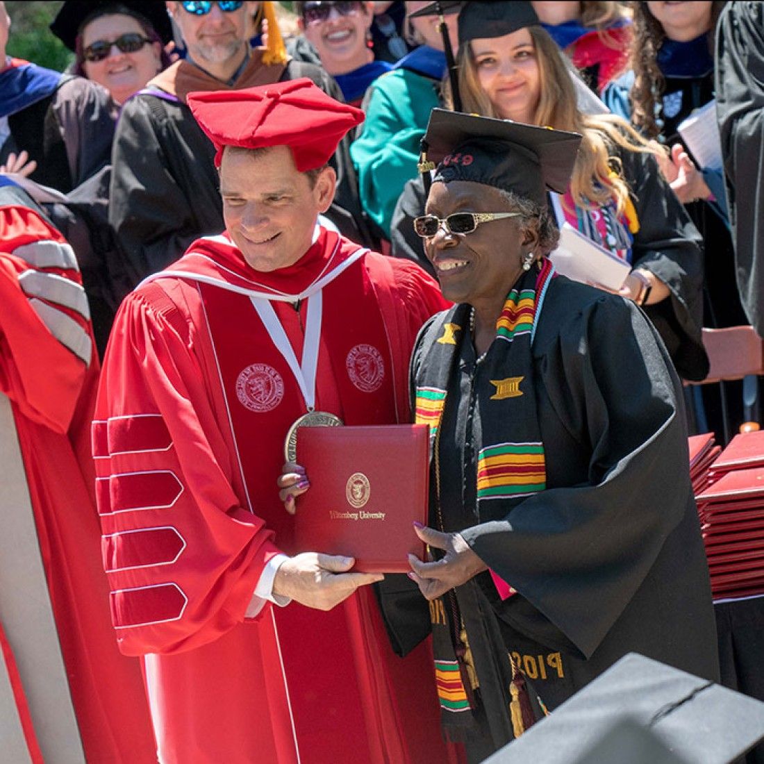 President Frandsen with Adult Student at Commencement