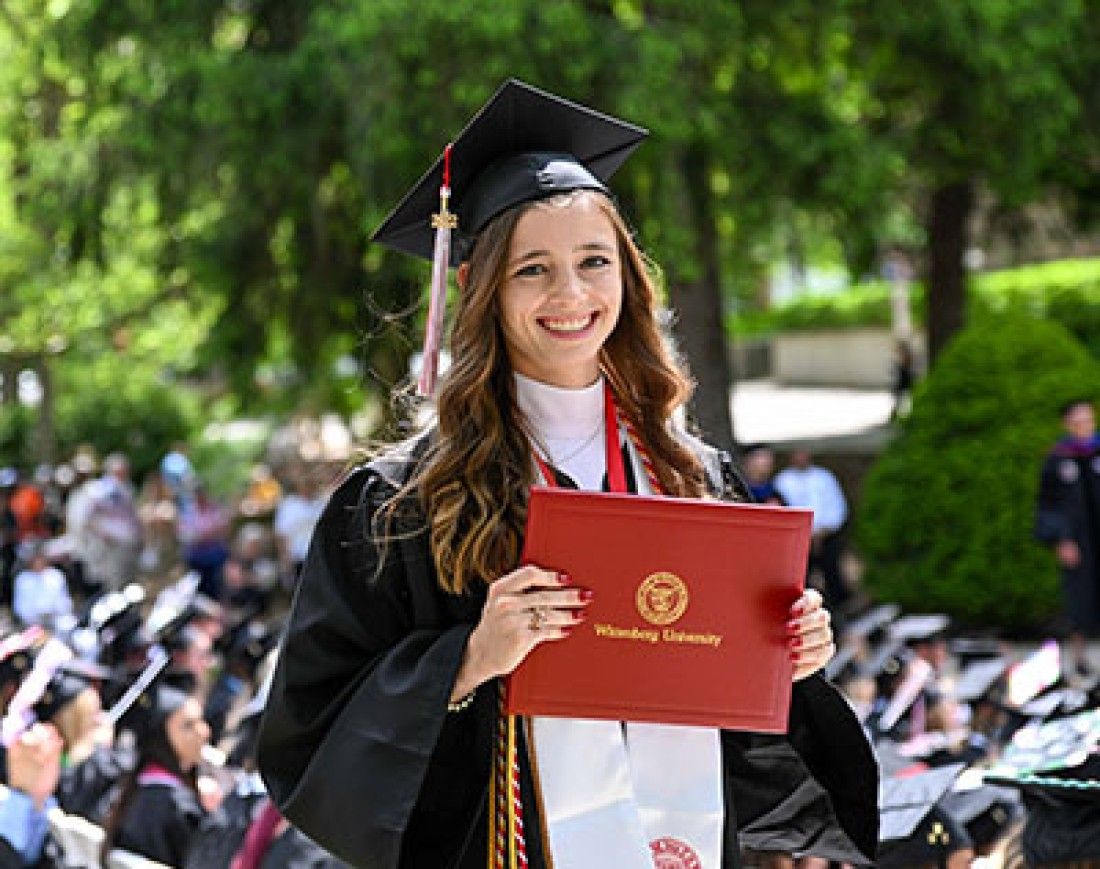 Wittenberg Student with Diploma